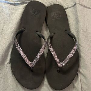 Reef black glittery flip flops